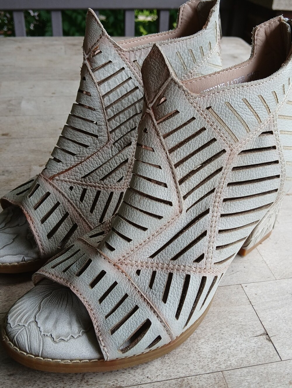 These are L'Artiste "Angular" booties Cutout Peep-Toe Booties in Light Beige.